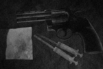 A revolver and pitchfork drug paraphernalia.