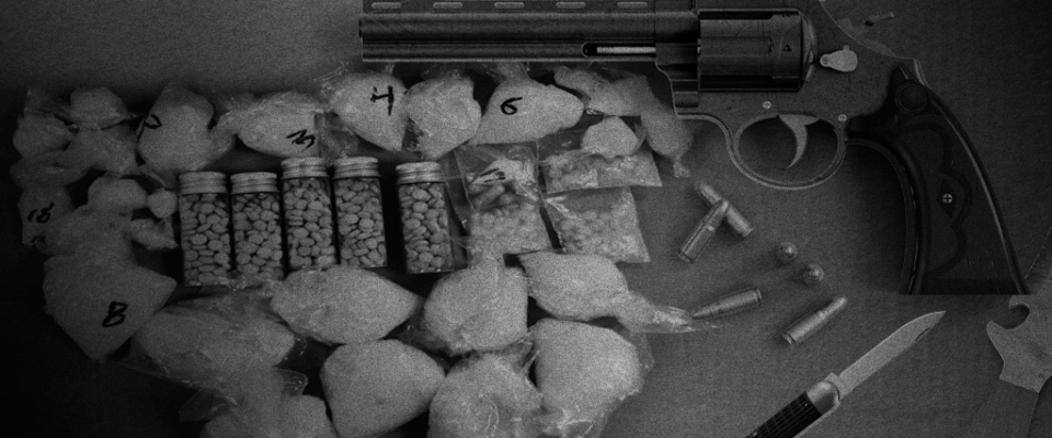 A revolver and some drug paraphernalia