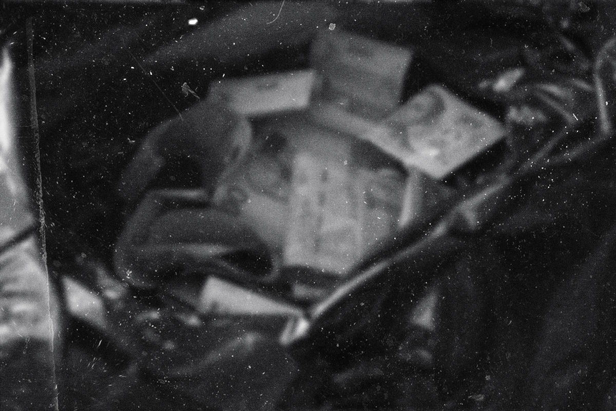 A black plastic trash bag filled with counterfeit lira.