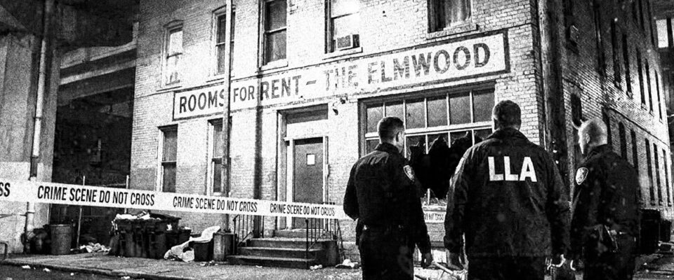 Three officers standing outside of a boarding house in Wilcox
